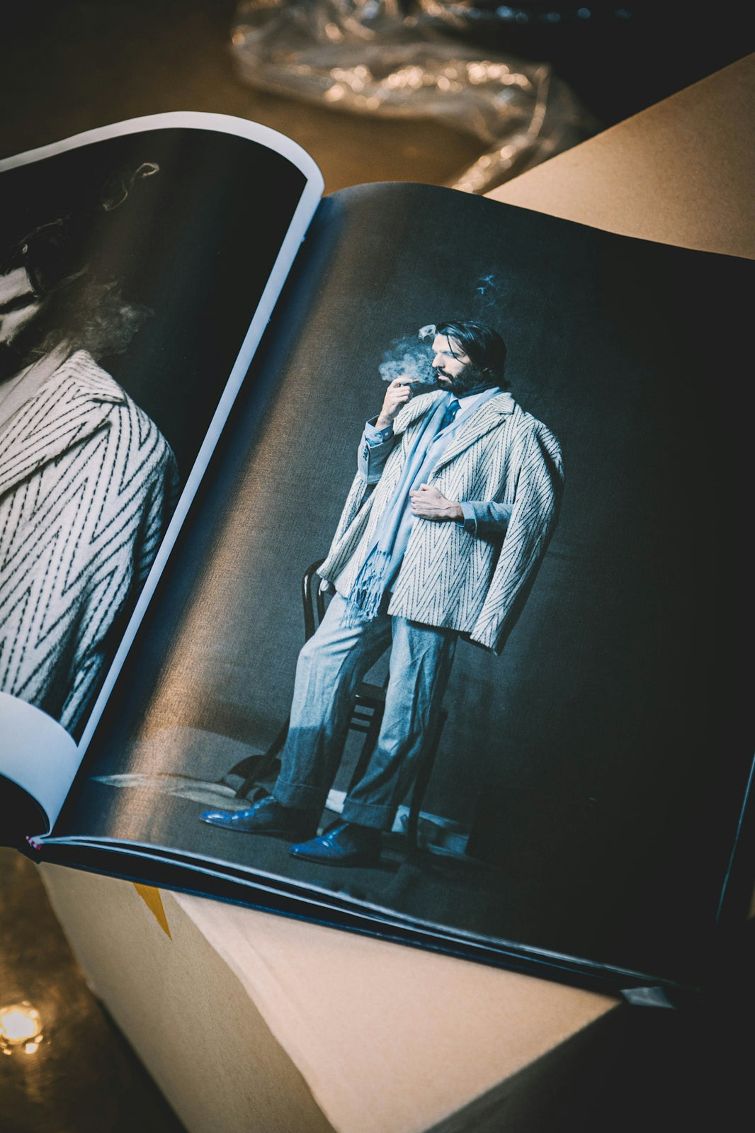 man wearing gray suit jacket magazine