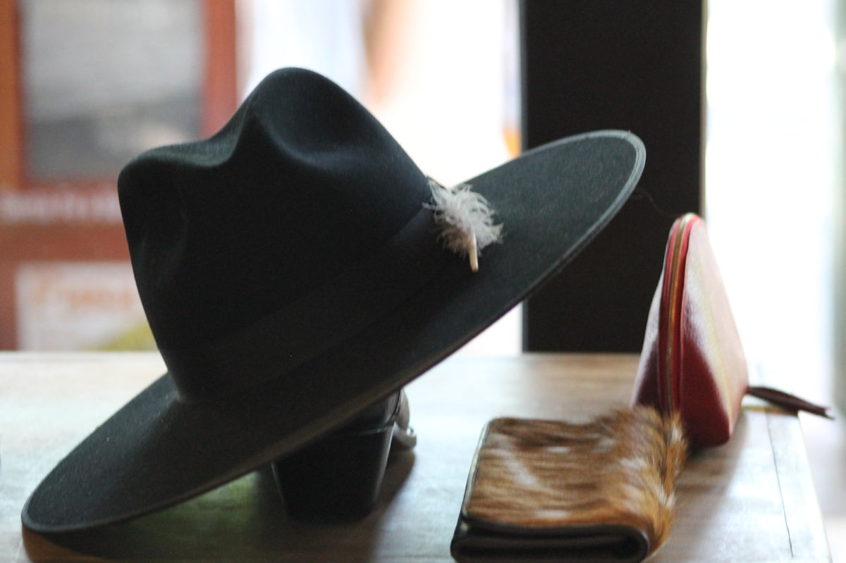 a black hat on a table
