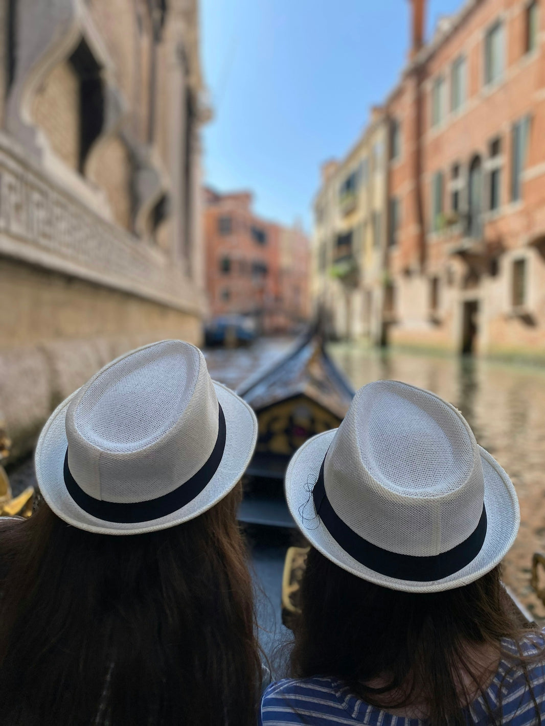 a group of people wearing hats