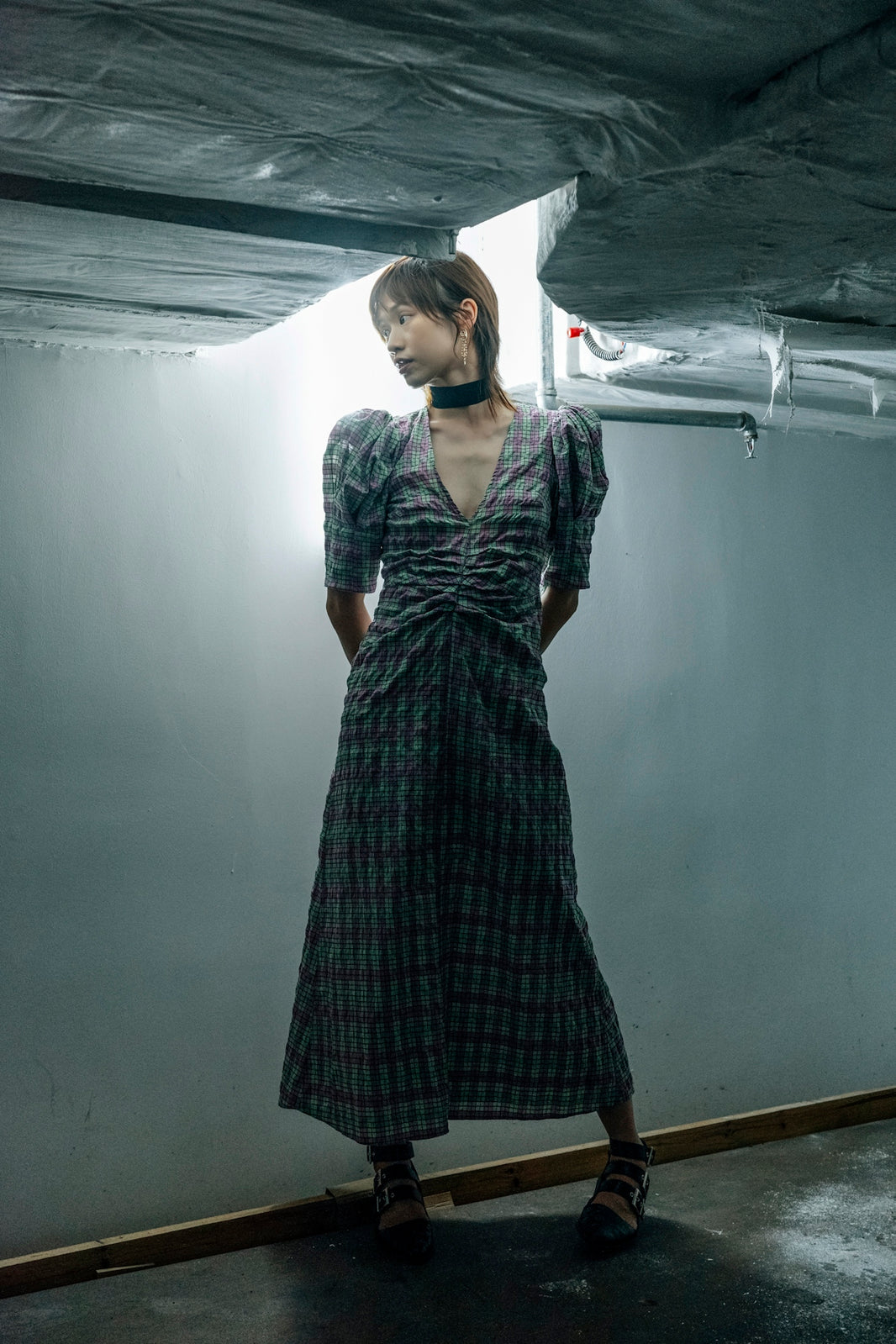 a person standing in front of a plane