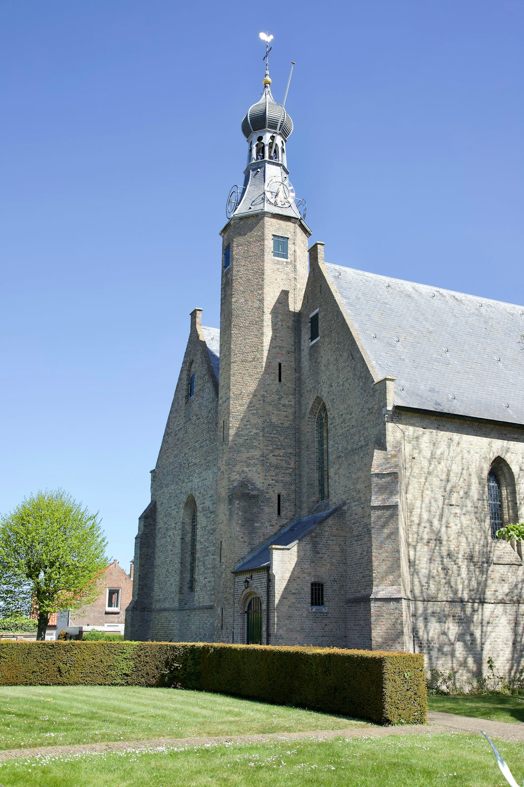 a church with a steeple and a clock tower