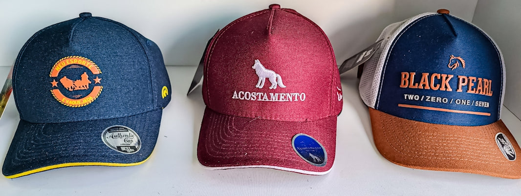 three hats are lined up in a row