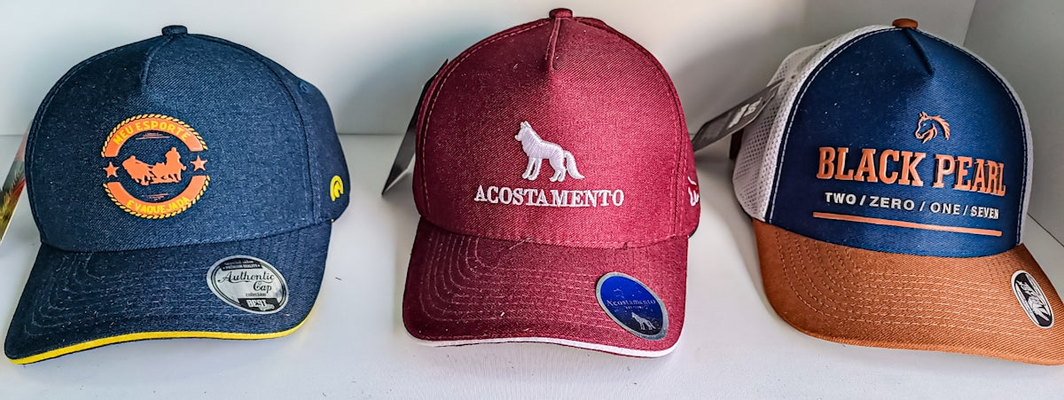 three hats are lined up in a row