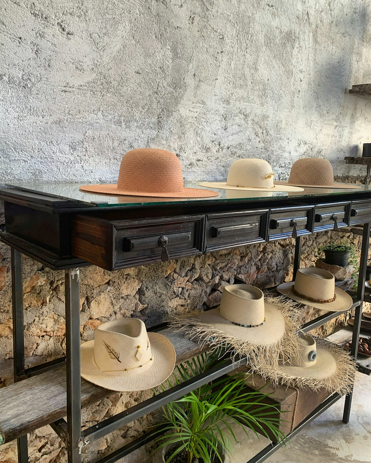 a table with hats on top of it
