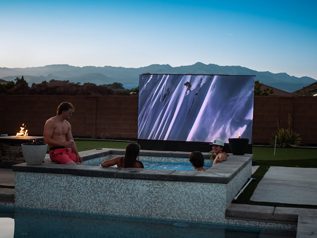 A group of people sitting around a hot tub