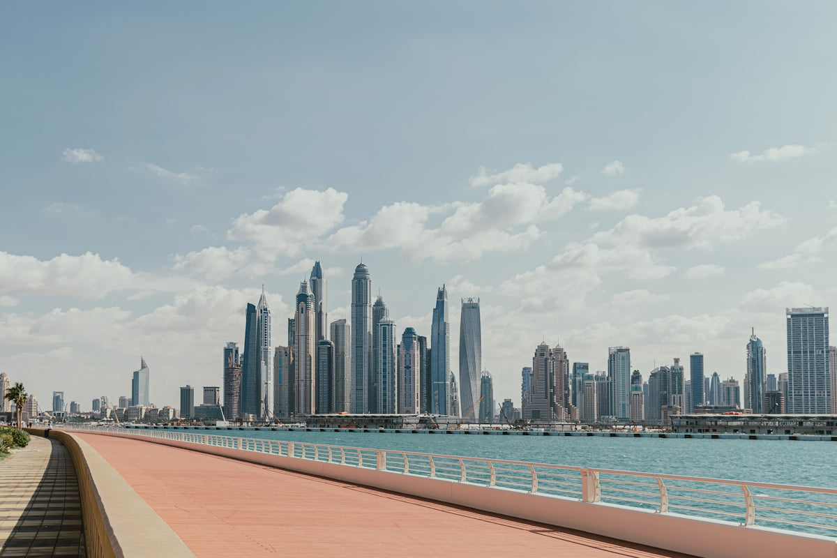 A view of a city skyline from a bridge