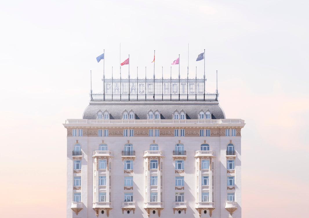 Grand hotel building with flags on roof