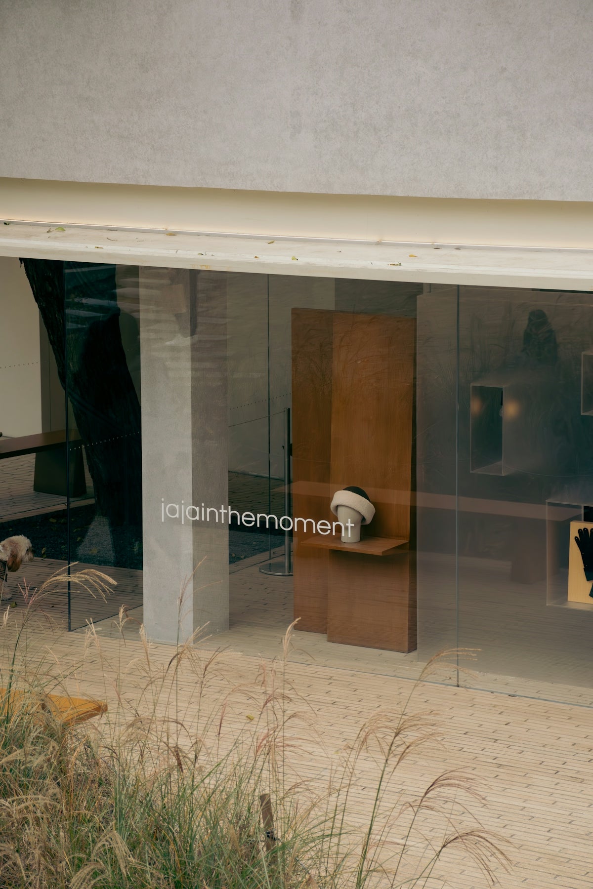 Store window display with text and products
