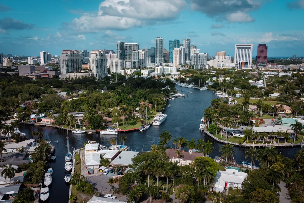 City skyline over a canal with boats and boats