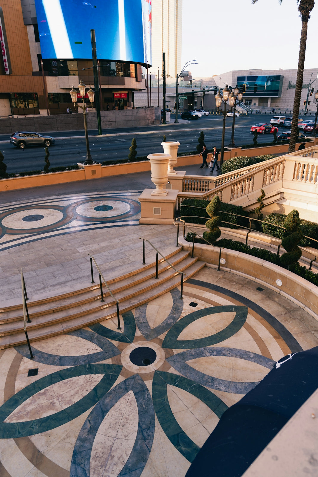 Decorative mosaic floor with stairs and buildings