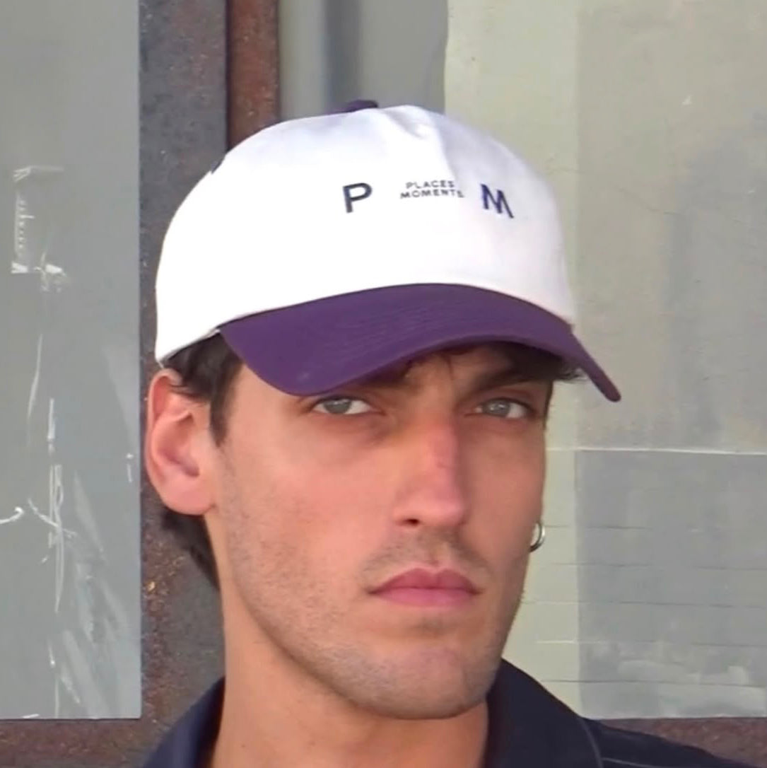 Logo Baseball Cap in cream and purple two-tone with Places Moments logo on front