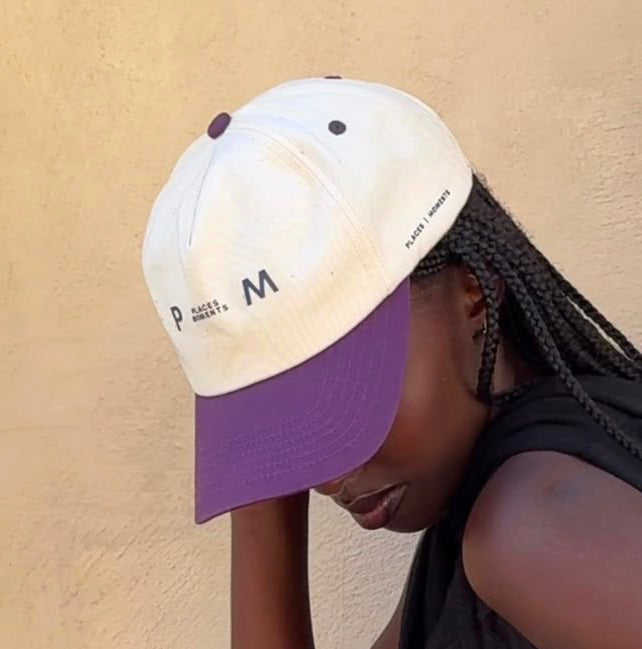 Logo Baseball Cap in cream and purple two-tone with Places Moments front logo and Crown Gate back detail