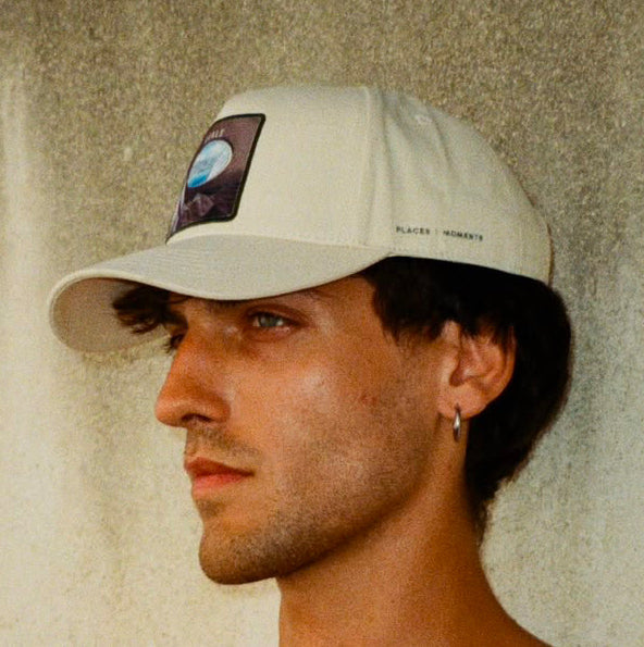 Ovals Baseball Cap in cream cotton with green oval window patch and adjustable snapback