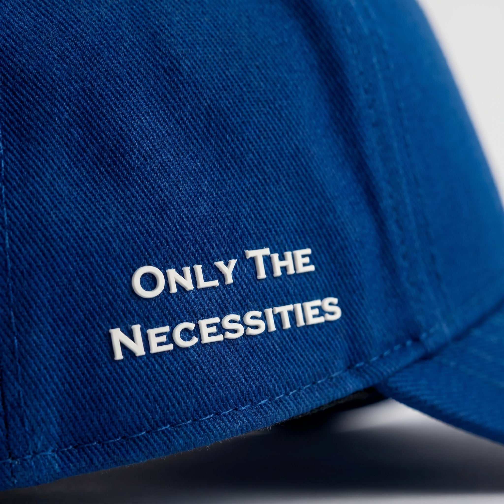 Blue Nixon Baseball Cap with curved brim and Places | Moments patch