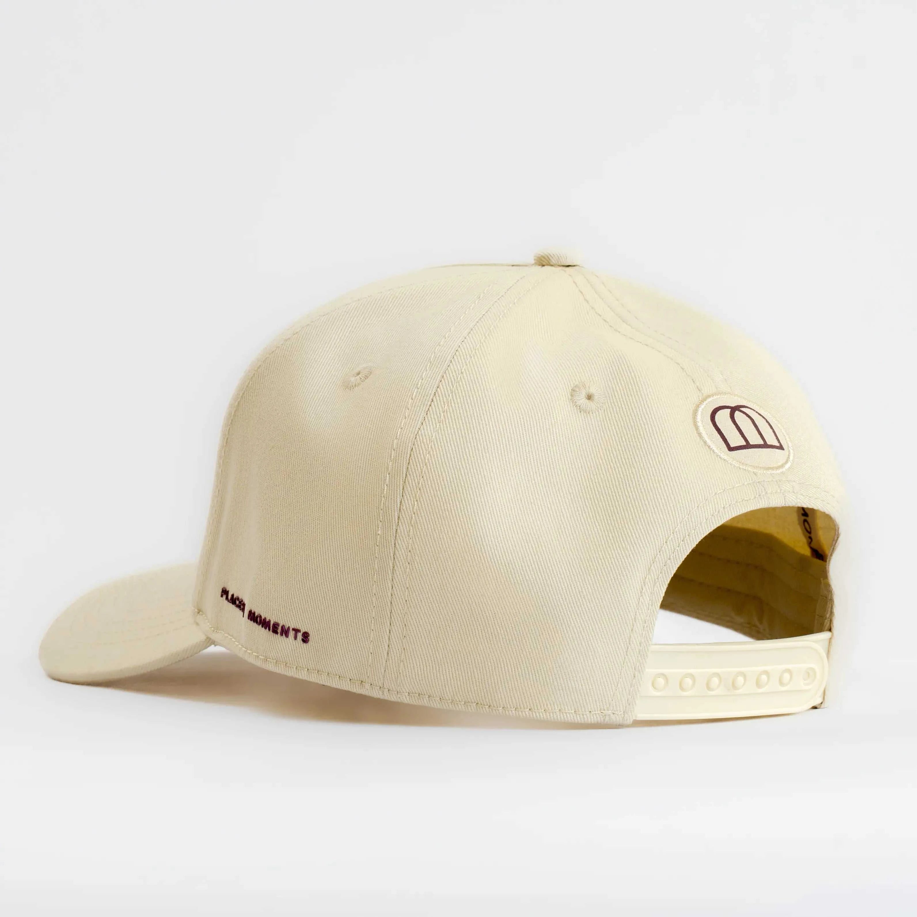 Côte Baseball Cap in Isla Crema soft linen with curved brim and signature patch, off-white color.