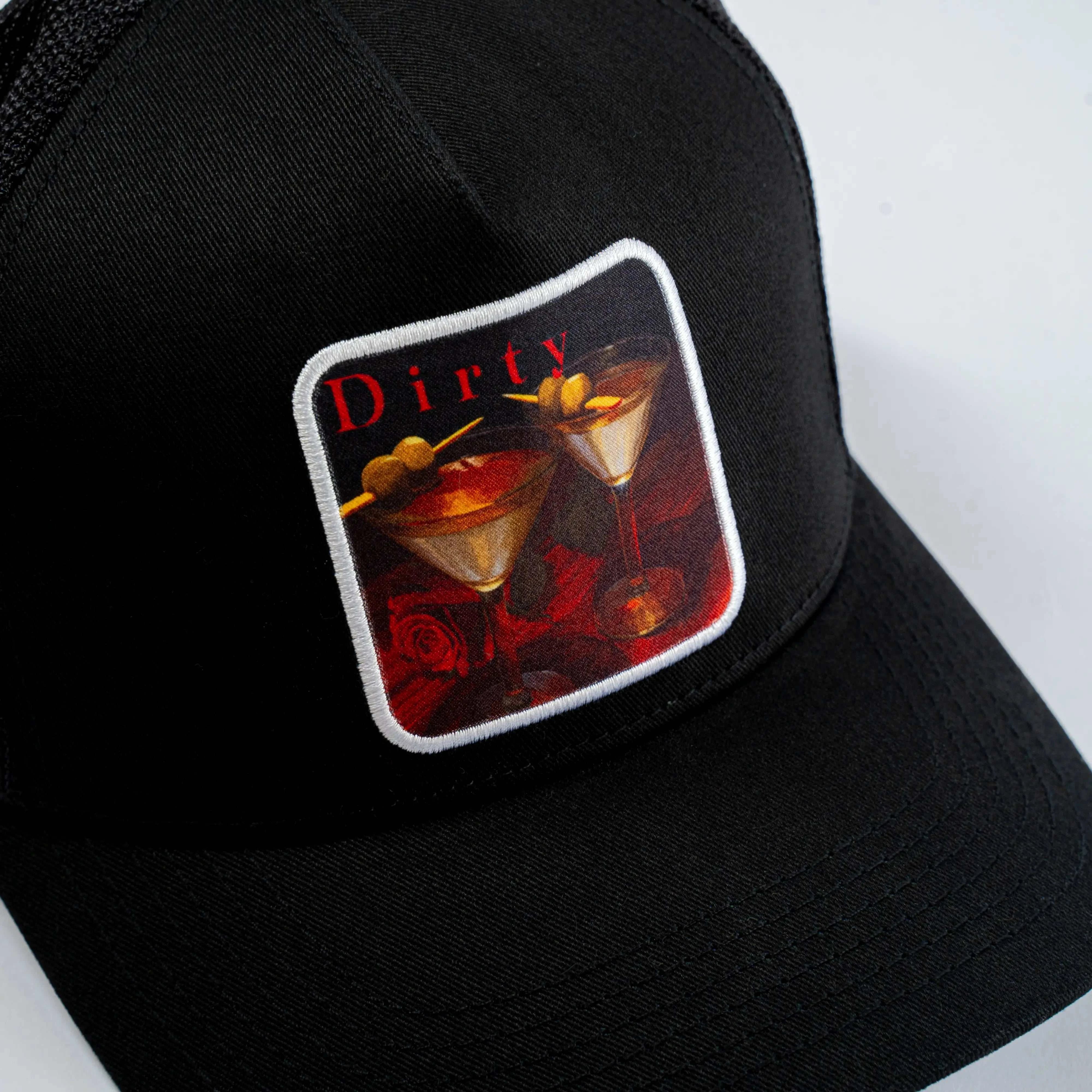 Black Dirty Martini Trucker Hat with mesh back and embroidered cocktail patch