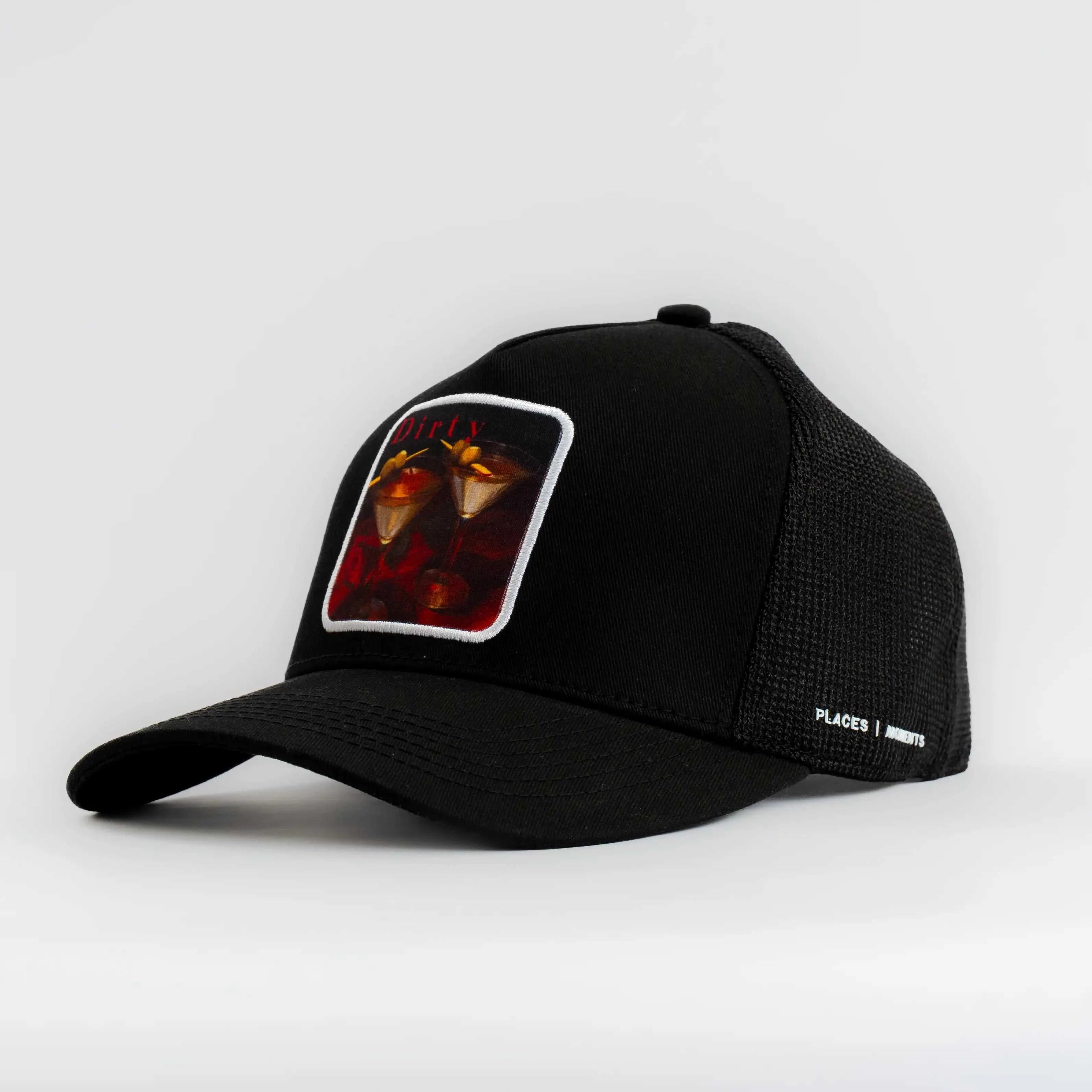 Black Dirty Martini Trucker Hat with mesh back and signature patch in Nightcap Black