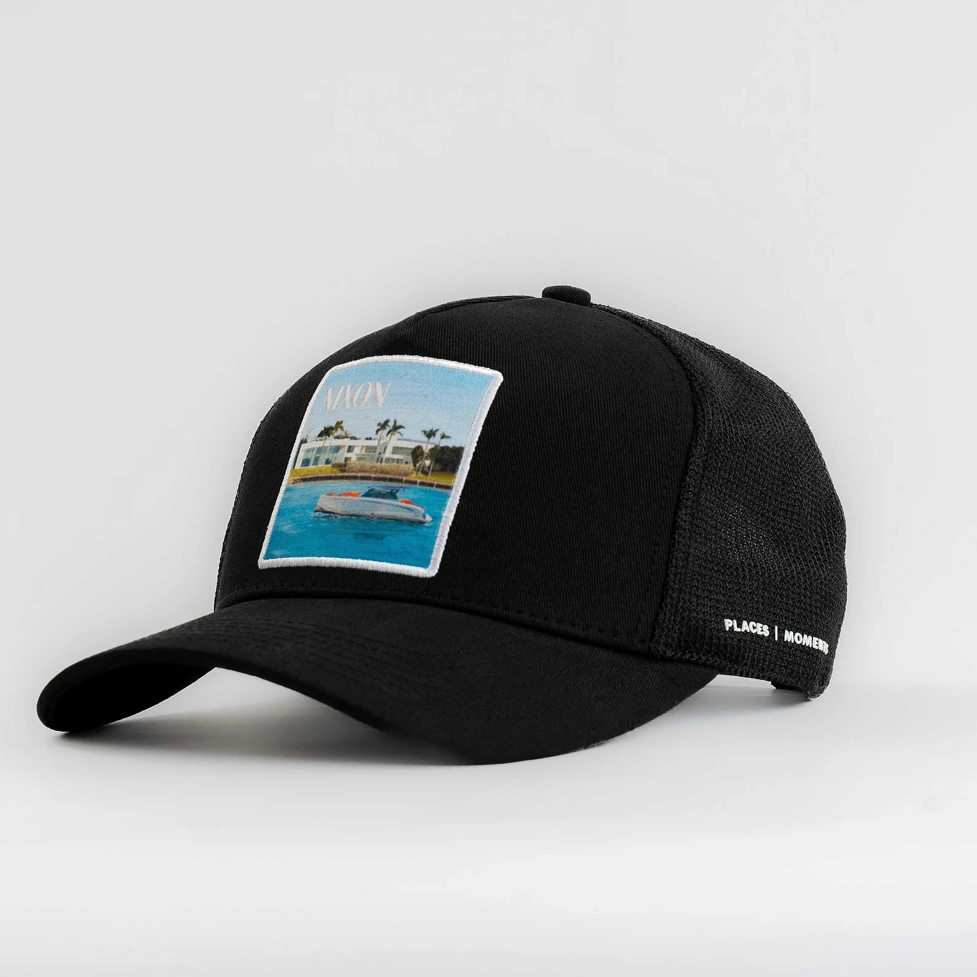 Black Nixon Mesh-Back Trucker Hat with curved brim and embroidered beach scene patch