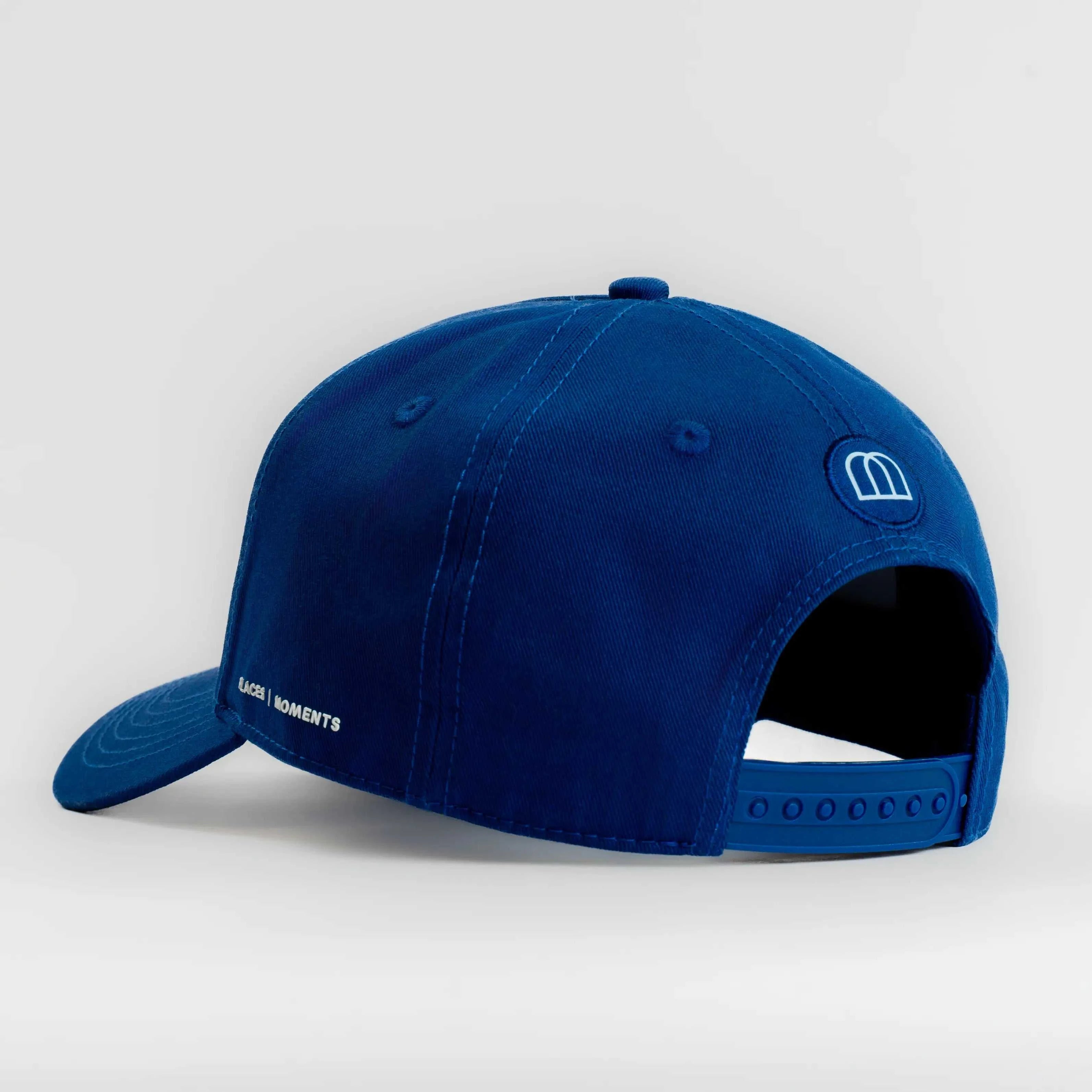 Blue Nixon Baseball Cap with cotton build, structured crown, curved brim, and signature Places | Moments patch.