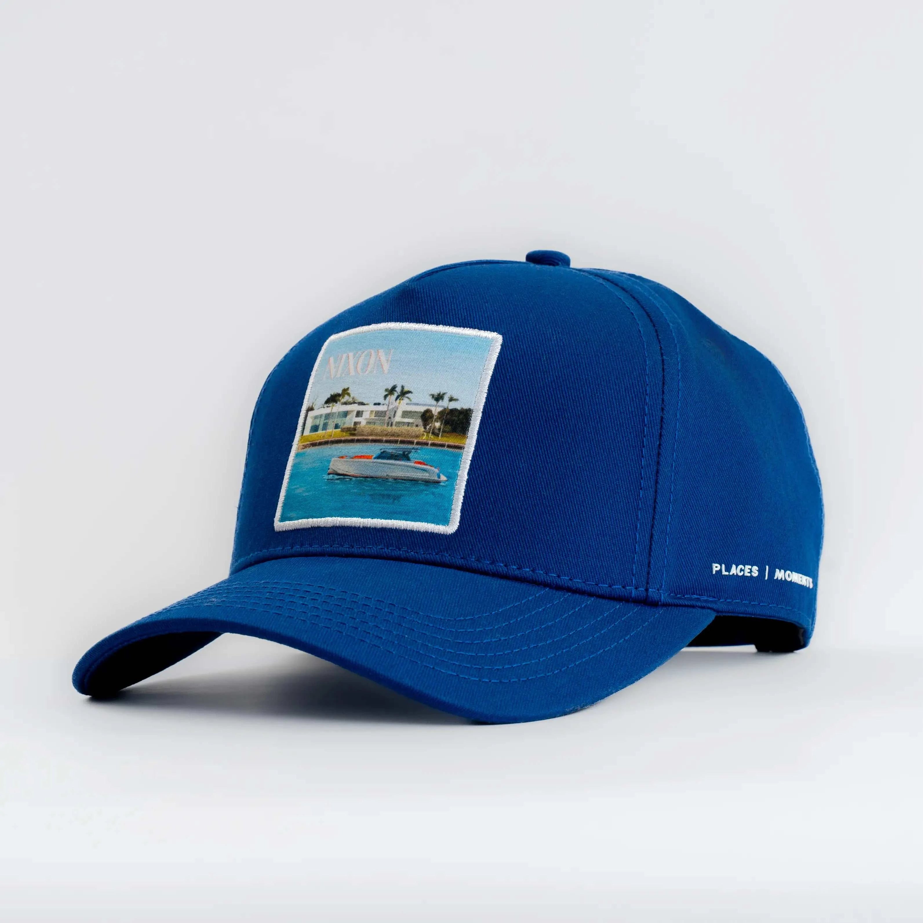 Blue Nixon Baseball Cap with coastal patch and curved brim by Places | Moments