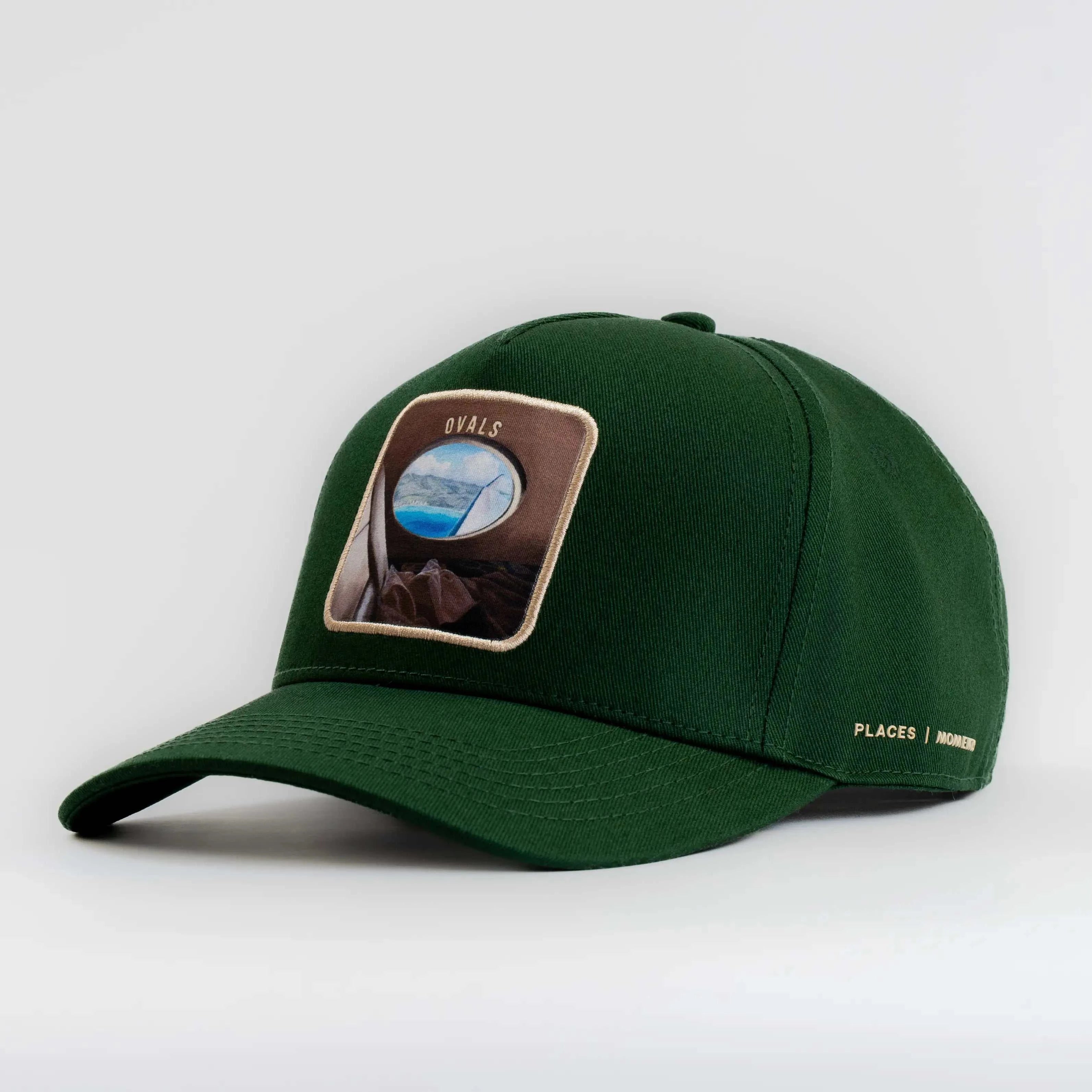 Forest green Ovals Baseball Cap with embroidered oval patch and Places Moments branding