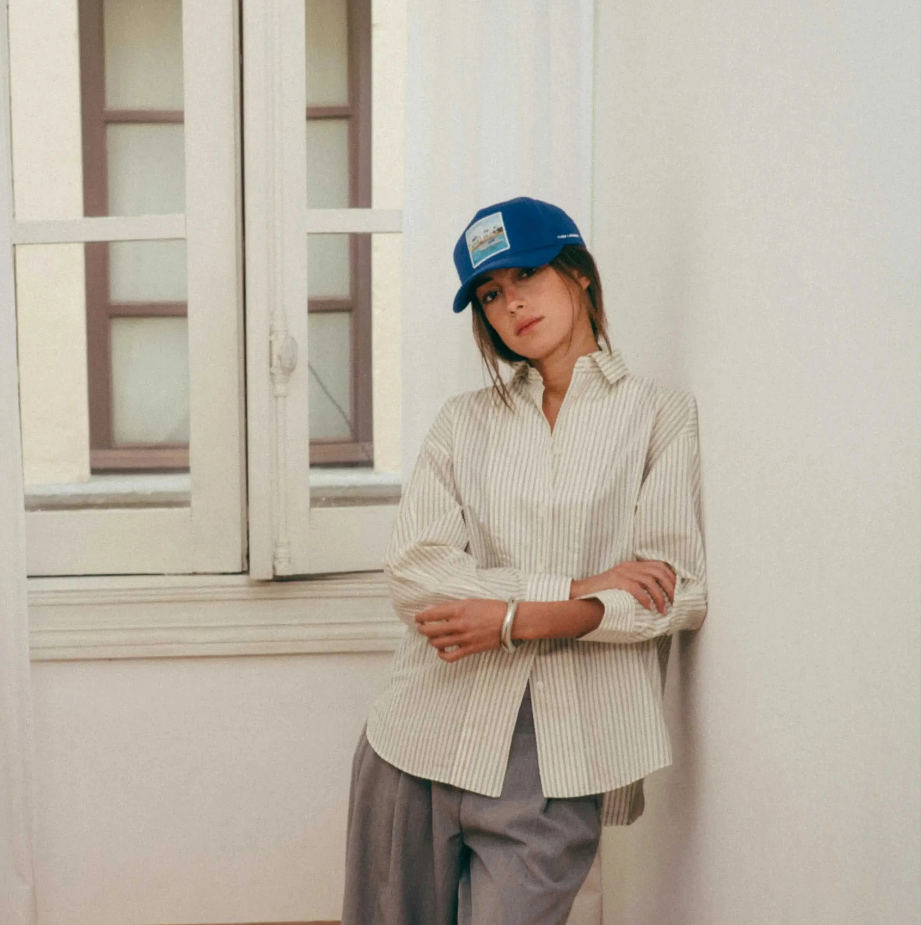 Blue Nixon Baseball Cap with curved brim and Places | Moments patch