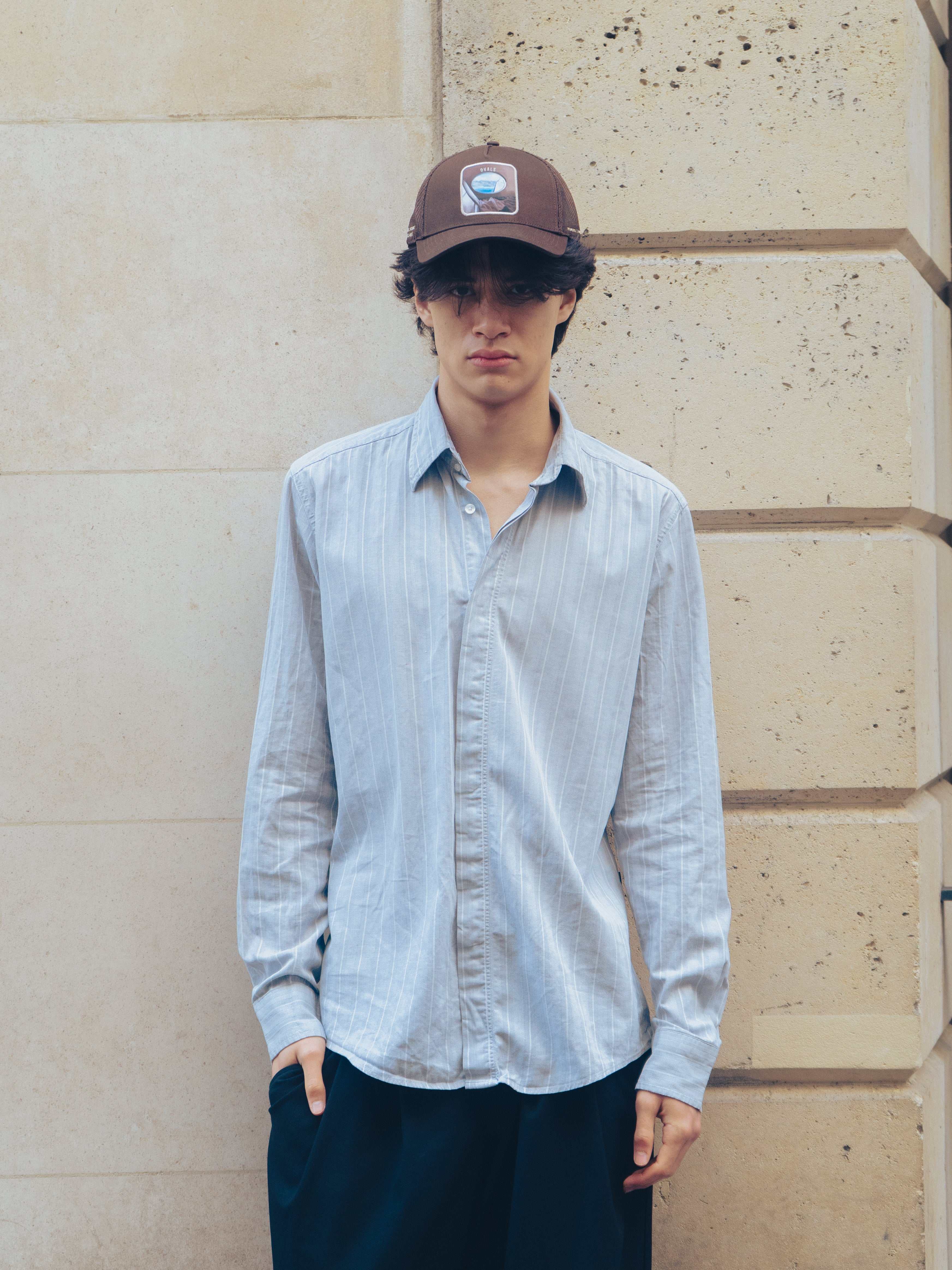 Brown Ovals Mesh-Back Trucker Hat with chestnut front and tan breathable mesh back