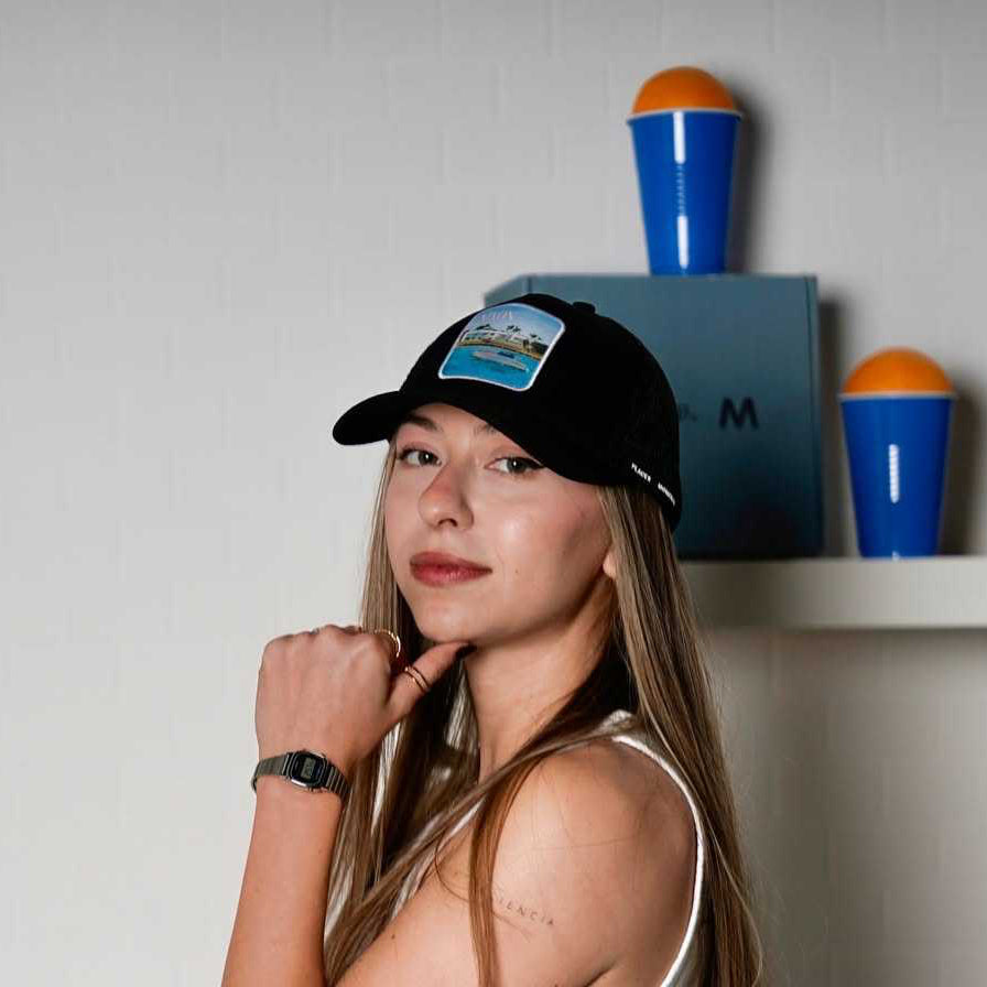 Black Nixon Mesh-Back Trucker Hat with embroidered Places | Moments patch and breathable mesh back
