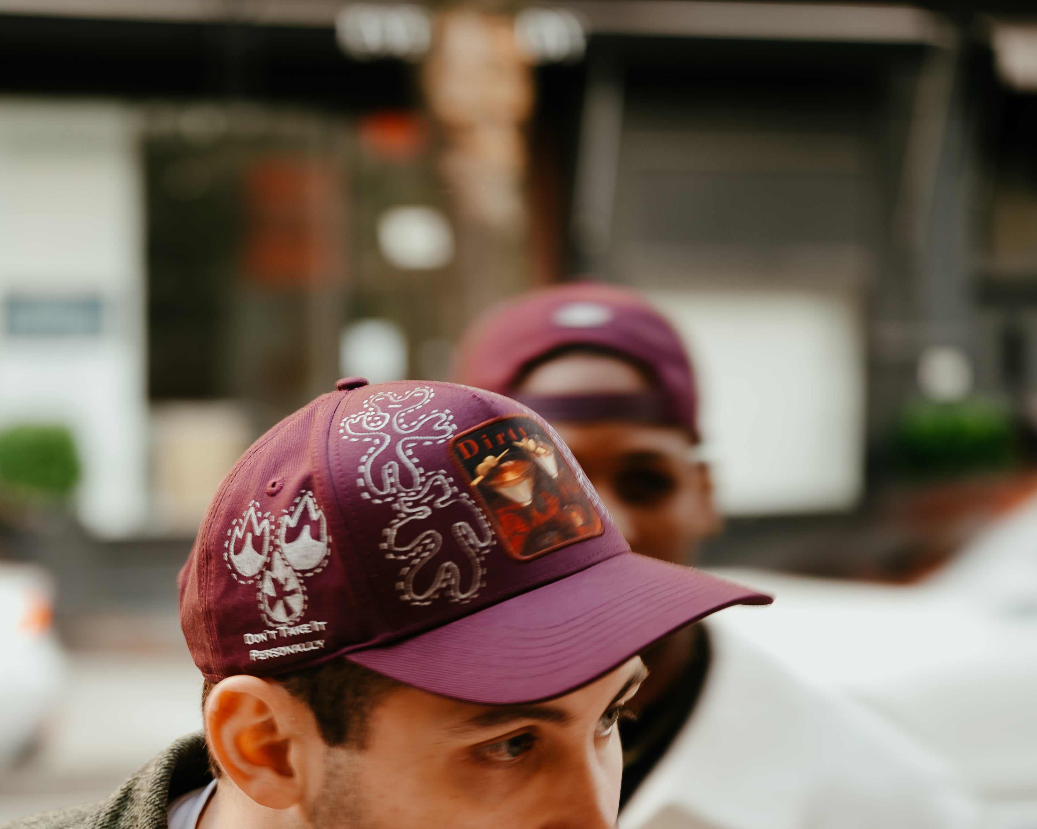 Dirty Martini limited edition baseball cap hand-painted by artist Muji with unique organic characters