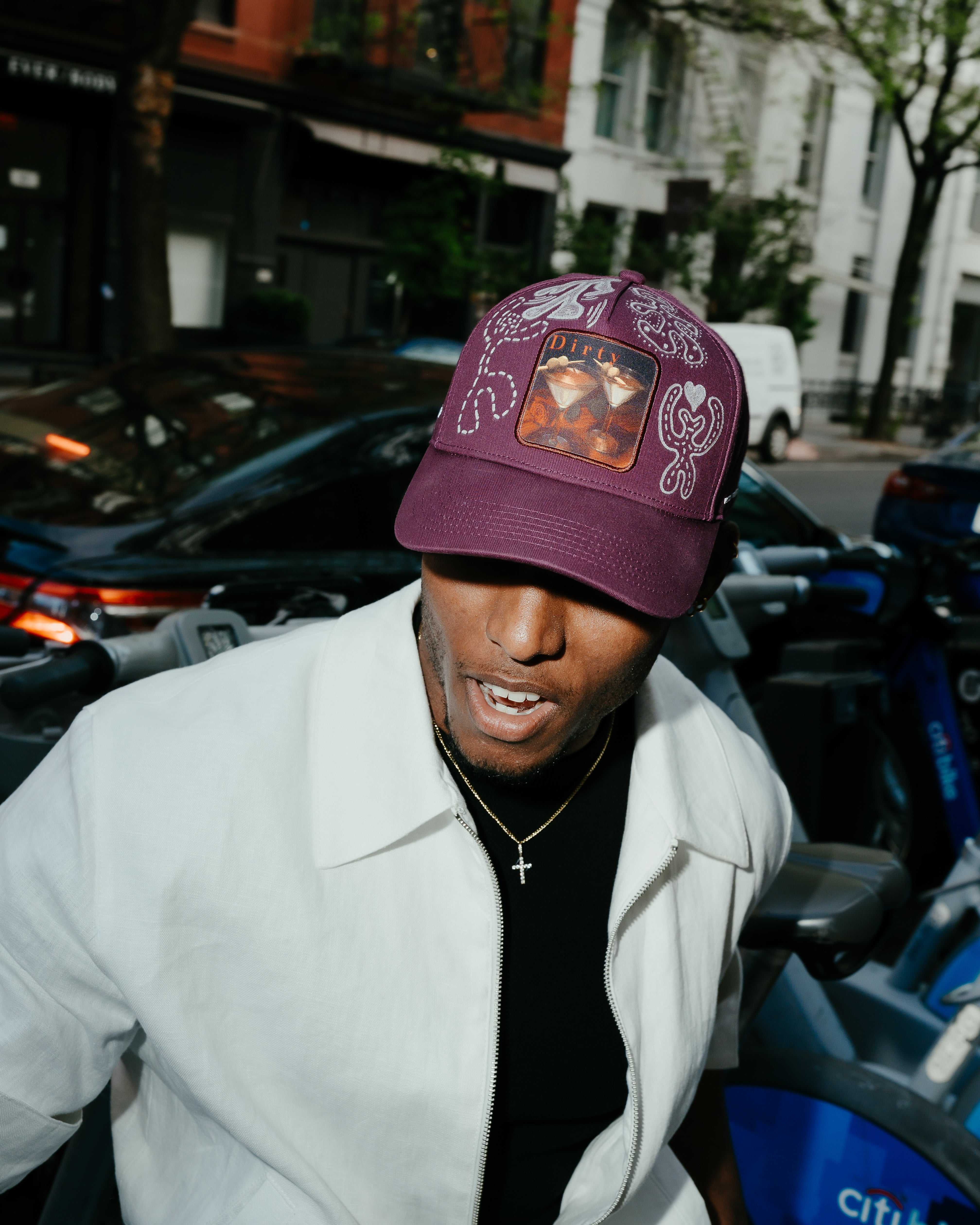 Dirty Martini × Muji limited edition Indian Creek Red baseball cap with unique hand-drawn artwork and raised lettering
