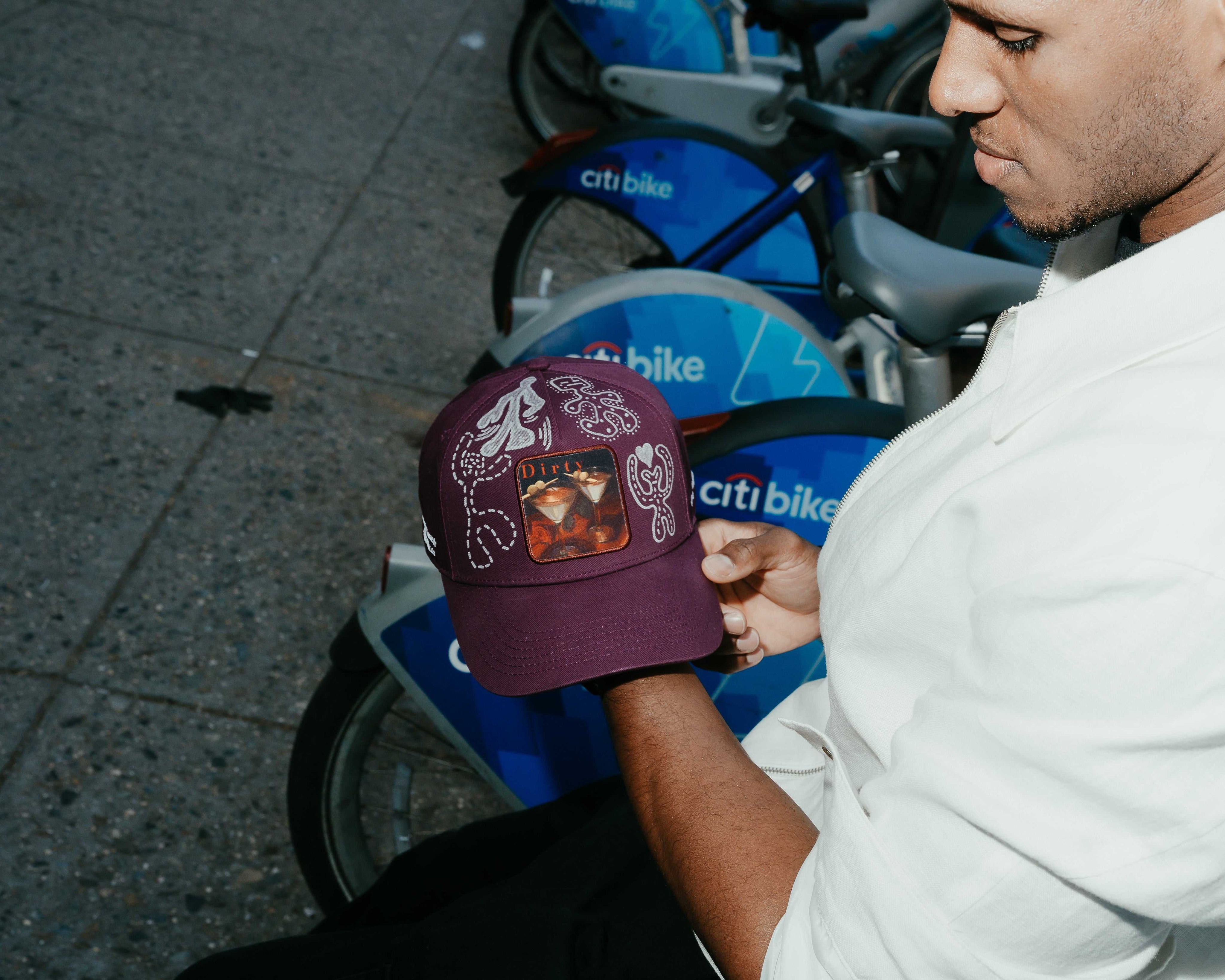 Dirty Martini x Muji limited edition baseball cap with hand-drawn artwork and curved brim